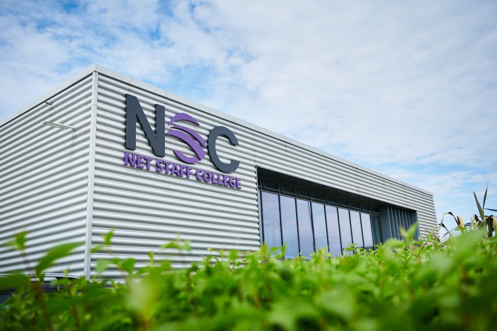 NET Staff College partner with The Aim Group to offer qualifications to parents and carers.